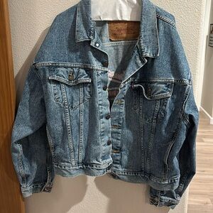 Levi’s size Large Men’s faded thick denim with embroidery on the back.